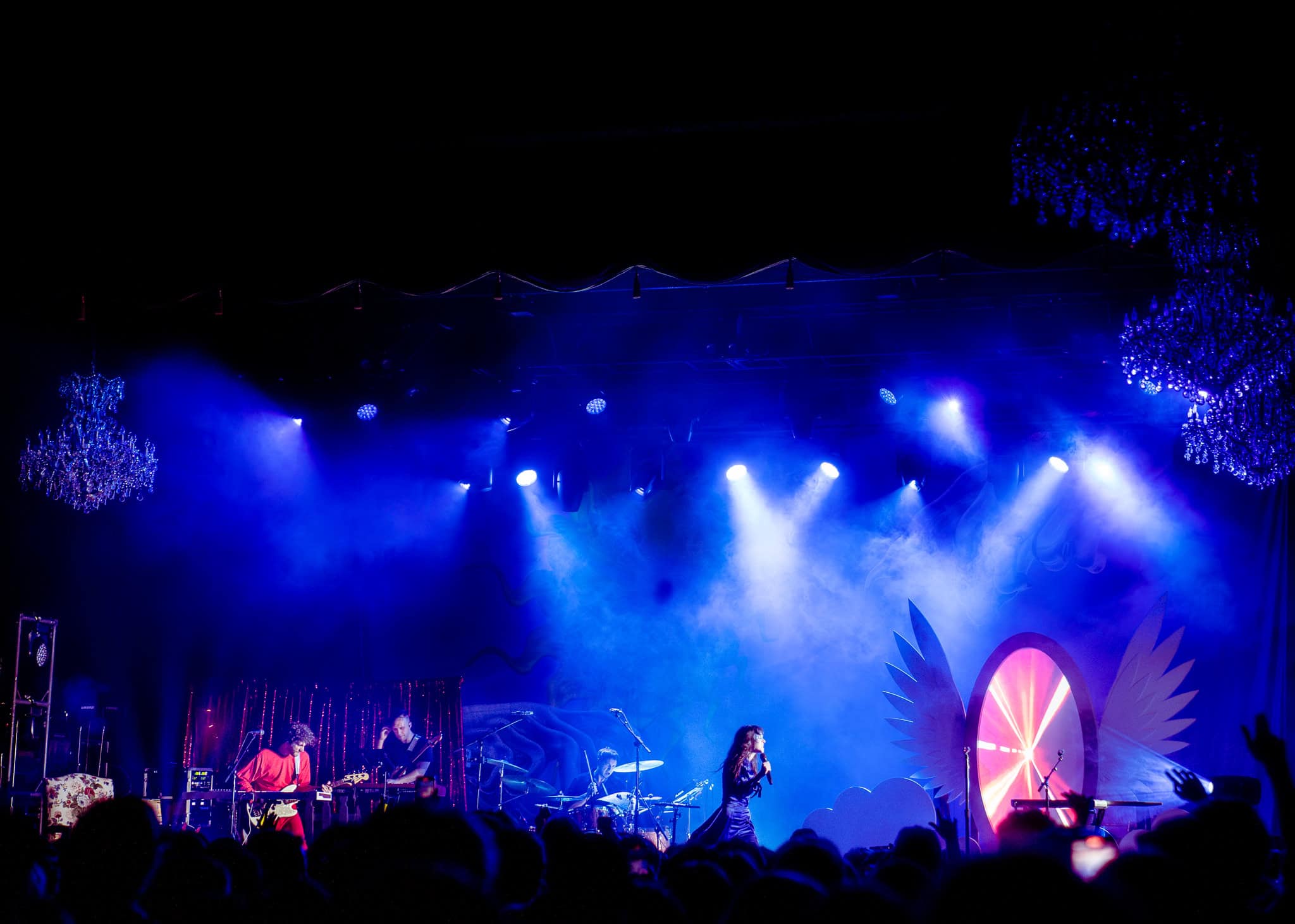 Indie-electronic band, Madgalena Bay performing at the Fillmore. A wide shot of the stage from the crowd.